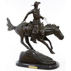 (After) Frederic Remington (American, 1861-1909) "The Cowboy of Arizona" Bronze Statue