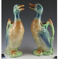 St. Clement, French ceramic duck shaped Ewers with polychrome decoration.