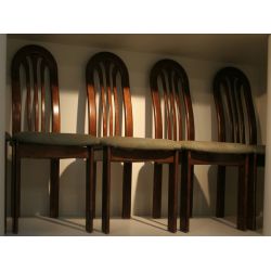 Lubke, set of four German dining chairs with arched wood back, upholstered seat.